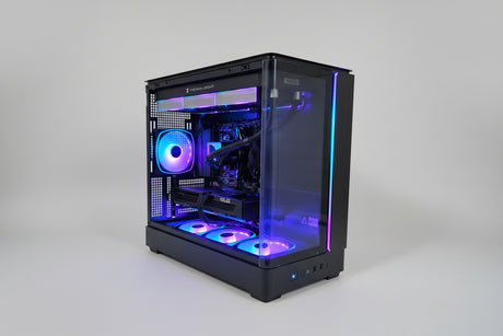 Glossy black computer case with RGB lighting on a white surface