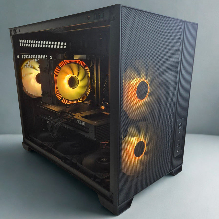 Computer case with glowing fans on a gray background